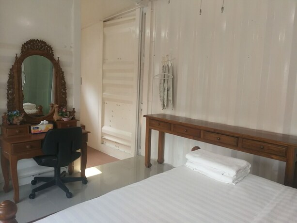 Imagen de la habitación del Hotel Farsai Homestay. Foto 19