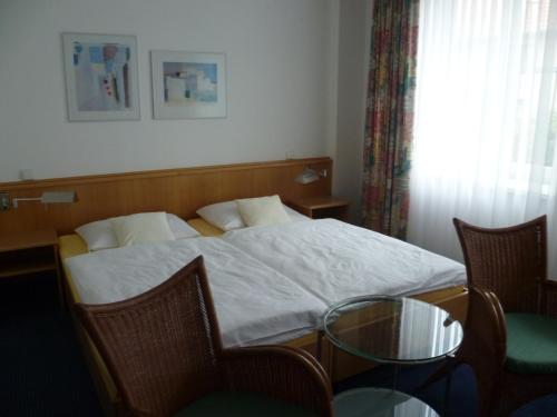 Imagen de la habitación del Hotel Fasanengarten. Foto 8