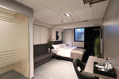 Imagen de la habitación del Hotel Fashion City. Foto 7