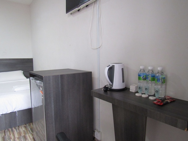 Imagen de la habitación del Hotel Fast Idaman. Foto 5