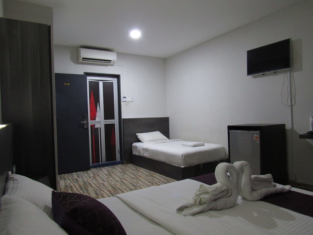Imagen de la habitación del Hotel Fast Idaman. Foto 12