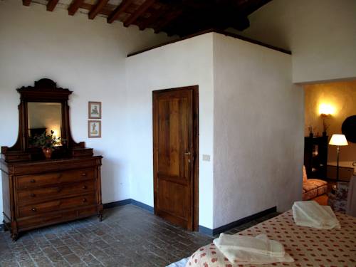 Imagen de la habitación del Hotel Fattoria Casa Sola. Foto 11