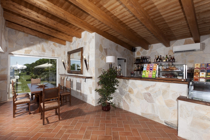 Imagen de la piscina del Hotel Fattoria Maremmana. Foto 15