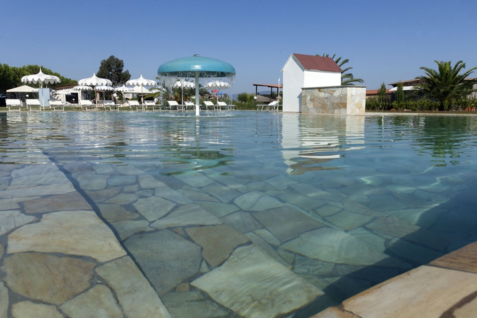 Imagen de la piscina del Hotel Fattoria Maremmana. Foto 16