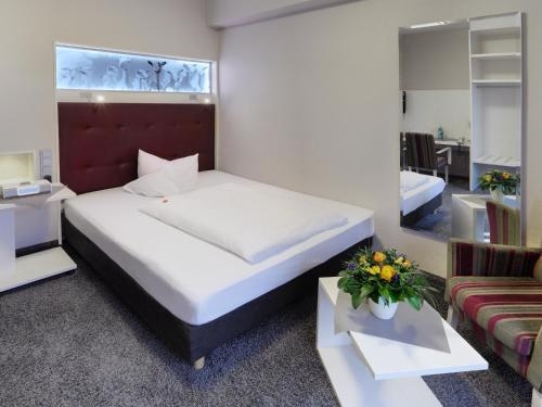 Imagen de la habitación del Hotel F&auml;hrhaus, Norden. Foto 8