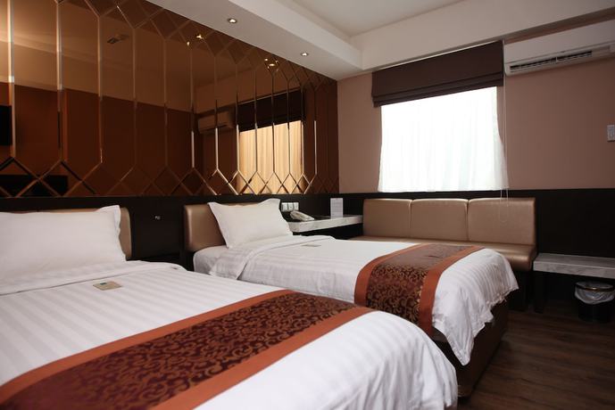 Imagen de la habitación del Hotel Favor Hotel. Foto 8