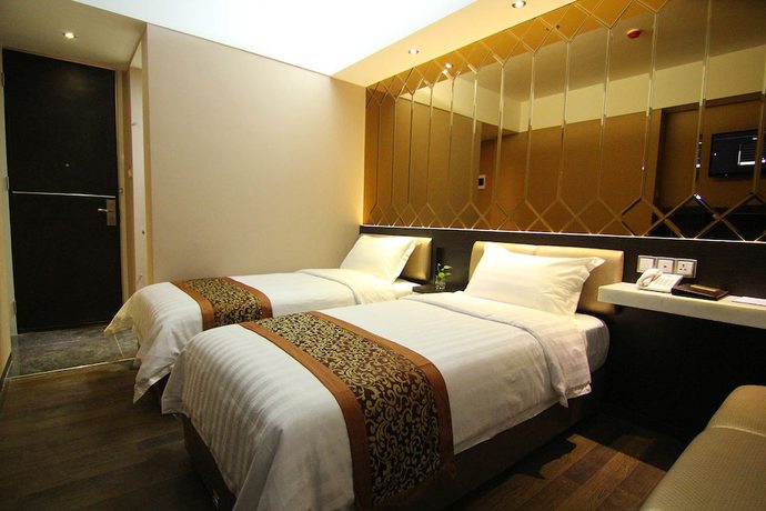 Imagen de la habitación del Hotel Favor Hotel. Foto 10