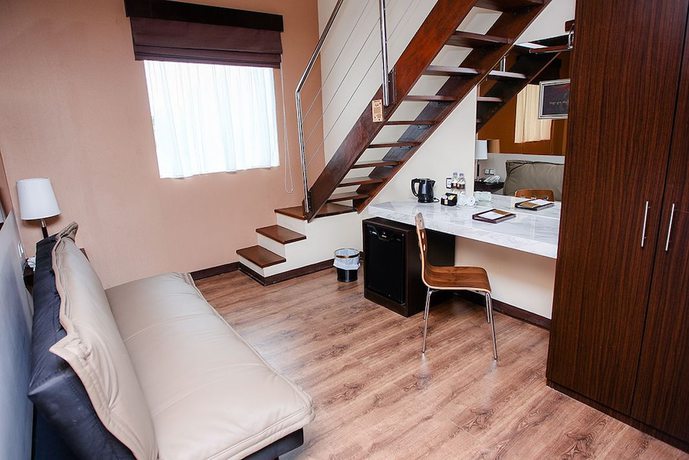 Imagen de la habitación del Hotel Favor Hotel. Foto 11