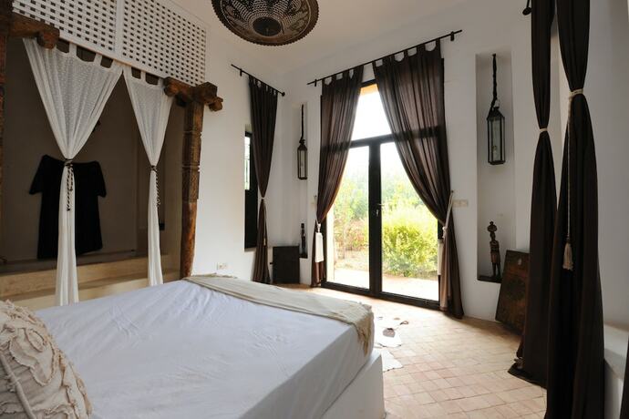 Imagen de la habitación del Hotel Fawakay Villas. Foto 14