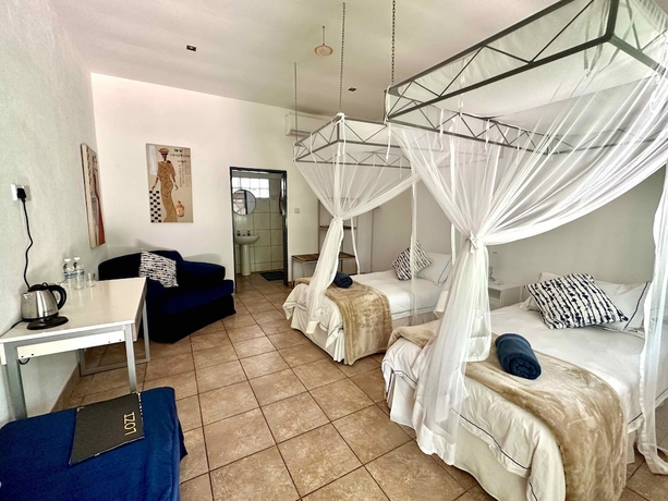 Imagen de la habitación del Hotel Fawlty Towers Guest House. Foto 3