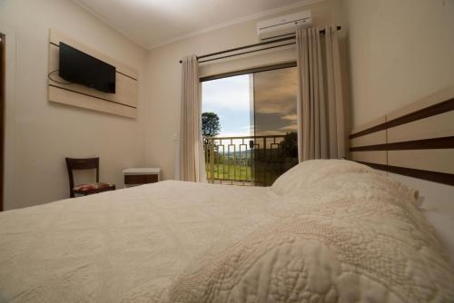 Imagen de la habitación del Hotel Fazenda Pocos De Caldas. Foto 8
