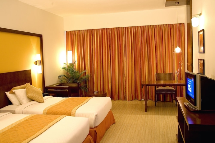 Imagen de la habitación del Hotel Featherlite Evoma. Foto 7