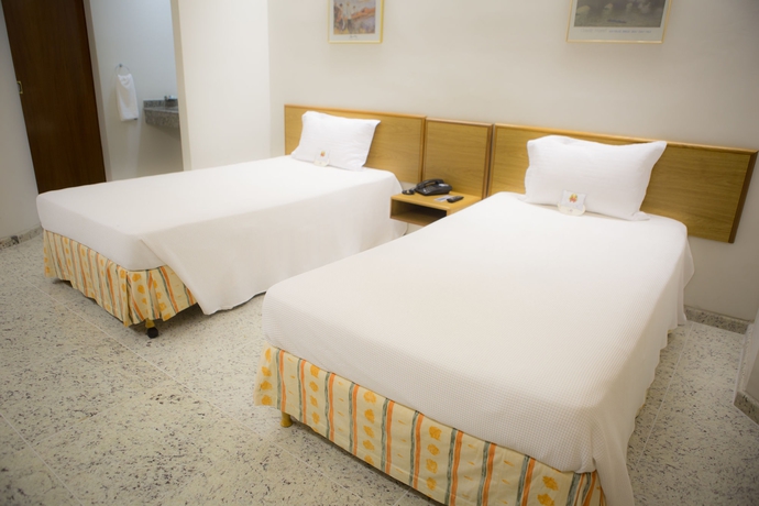 Imagen de la habitación del Hotel F&ecirc;nix Varginha. Foto 5