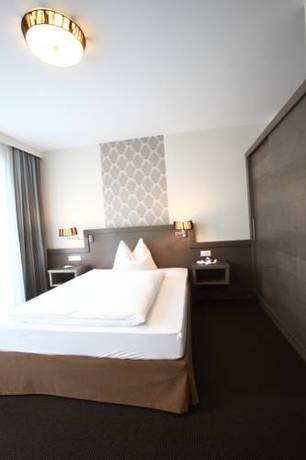 Imagen de la habitación del Hotel Feckl's Apart. Foto 8