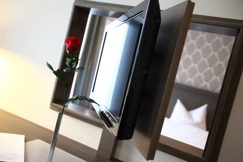 Imagen de la habitación del Hotel Feckl's Apart. Foto 11