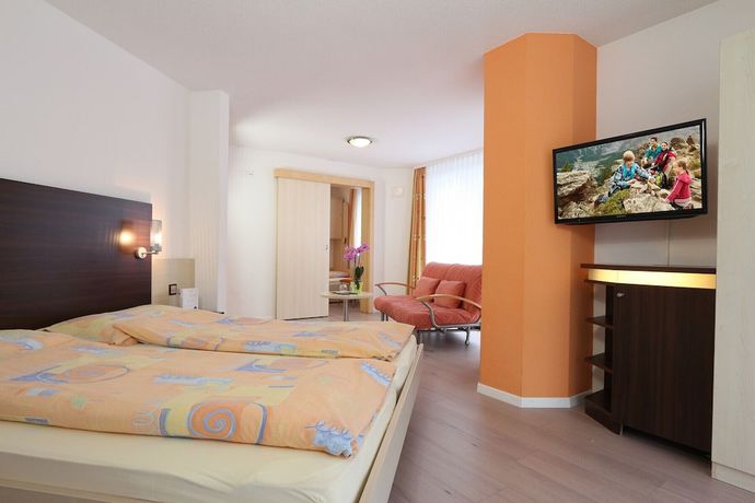 Imagen de la habitación del Hotel Feehof Garni. Foto 17