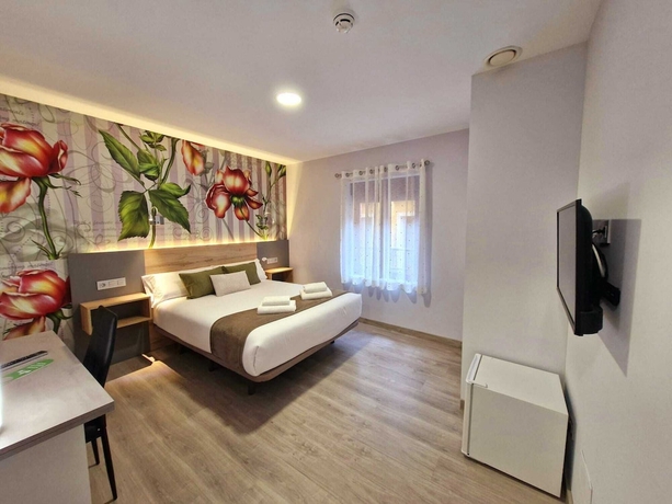 Imagen de la habitación del Hotel Feeling Home - SuitesandRooms. Foto 2
