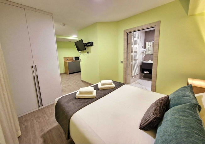 Imagen de la habitación del Hotel Feeling Home - SuitesandRooms. Foto 4