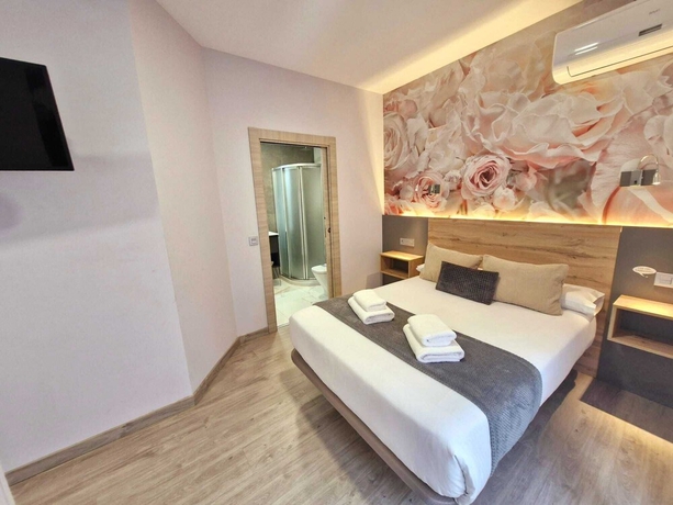 Imagen de la habitación del Hotel Feeling Home - SuitesandRooms. Foto 5