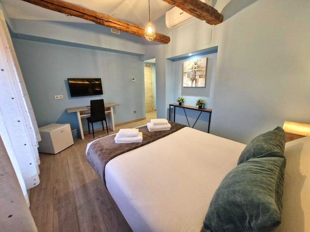 Imagen de la habitación del Hotel Feeling Home - SuitesandRooms. Foto 11