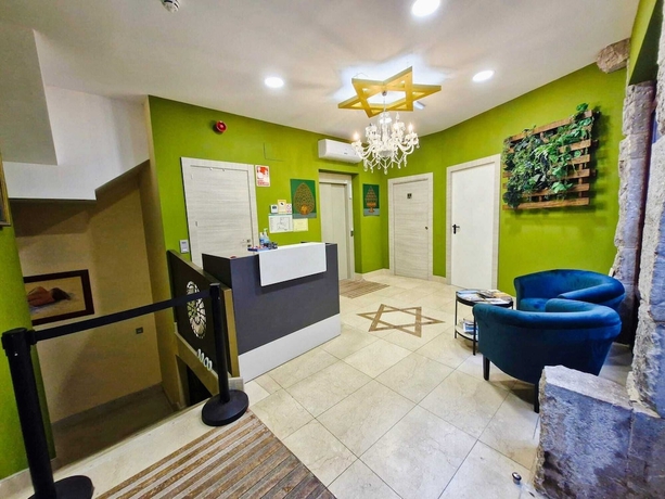 Imagen de los interiores del Hotel Feeling Home - SuitesandRooms. Foto 16