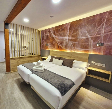 Imagen de la habitación del Hotel Feeling Home - SuitesandRooms. Foto 12