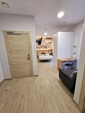 Imagen de la habitación del Hotel Feeling Home - SuitesandRooms. Foto 14