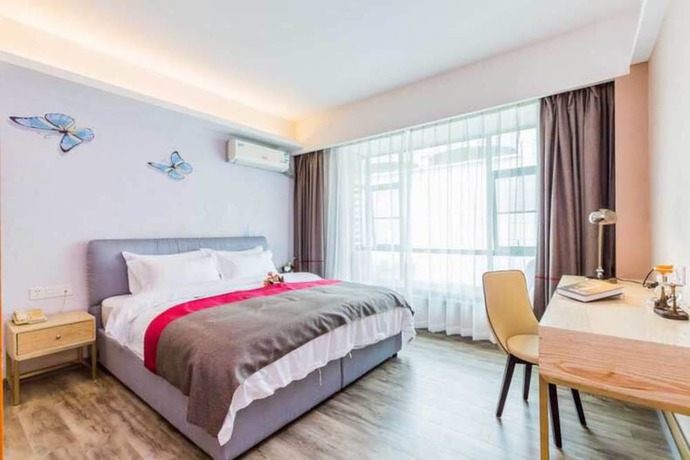 Imagen de la habitación del Hotel Fei Fan Holiday Guangzhou. Foto 6