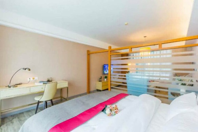 Imagen de la habitación del Hotel Fei Fan Holiday Guangzhou. Foto 9