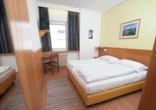 Imagen de la habitación del Hotel Feichter, Bolzano. Foto 8