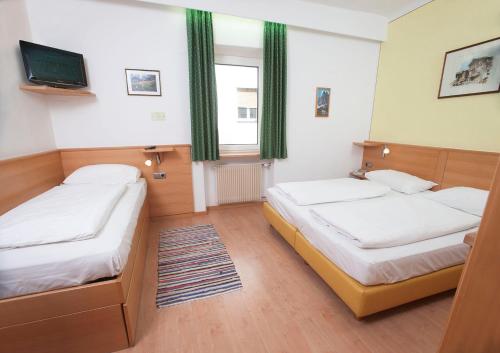 Imagen de la habitación del Hotel Feichter, Bolzano. Foto 9