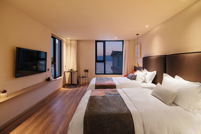 Imagen de la habitación del Hotel Feifan Hotel. Foto 4