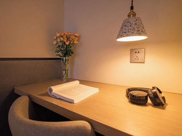 Imagen de la habitación del Hotel Feifan Hotel. Foto 5