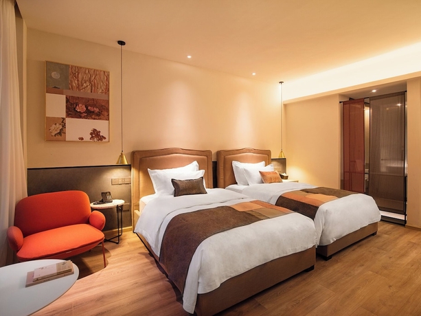 Imagen de la habitación del Hotel Feifan Hotel. Foto 6