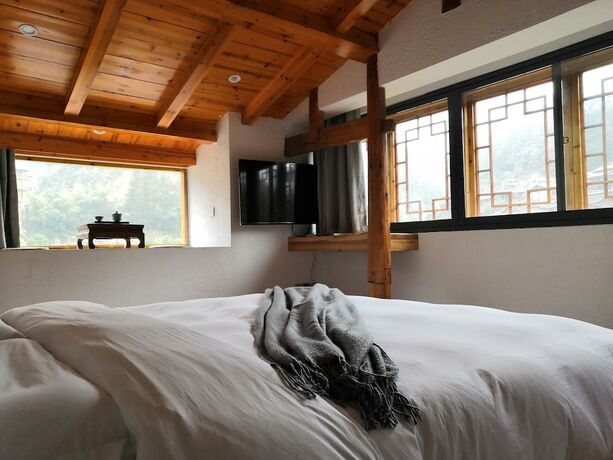 Imagen de la habitación del Hotel Feihua Inn. Foto 20