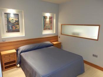 Imagen de la habitación del Hotel Feijoo Apartamentos Turisticos. Foto 9