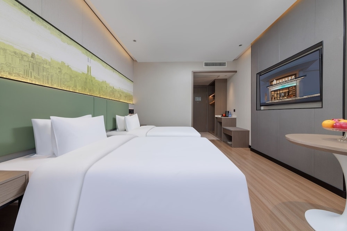 Imagen de la habitación del Hotel Feili Internation. Foto 6