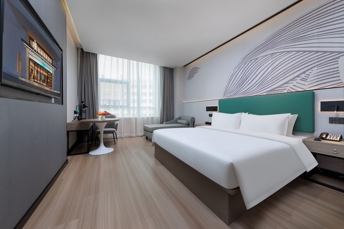 Imagen de la habitación del Hotel Feili Internation. Foto 8