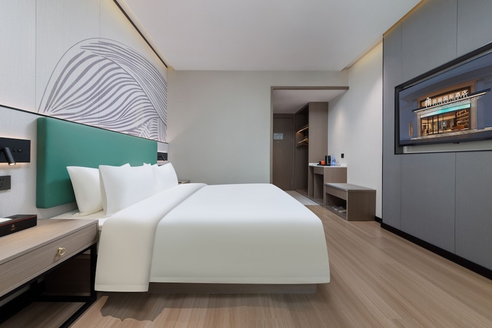 Imagen de la habitación del Hotel Feili Internation. Foto 10