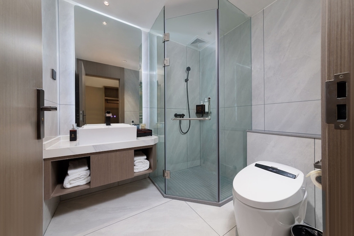 Imagen de la habitación del Hotel Feili Internation. Foto 12