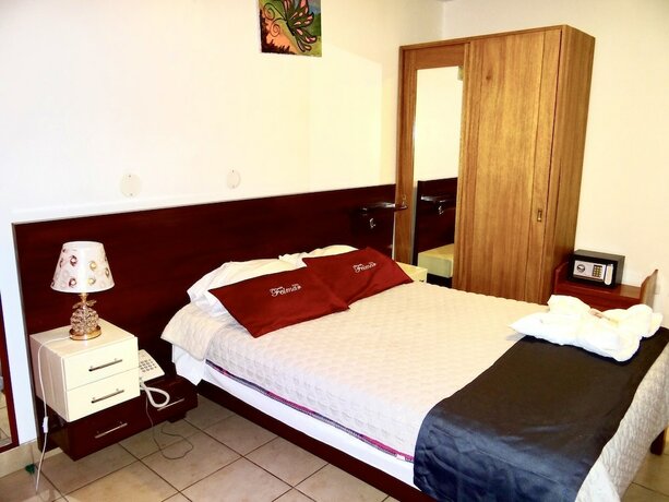 Imagen de la habitación del Hotel Feimar. Foto 13