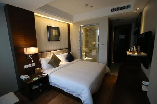 Imagen de la habitación del Hotel Feitian Meiju Baiyin Road Branch. Foto 8