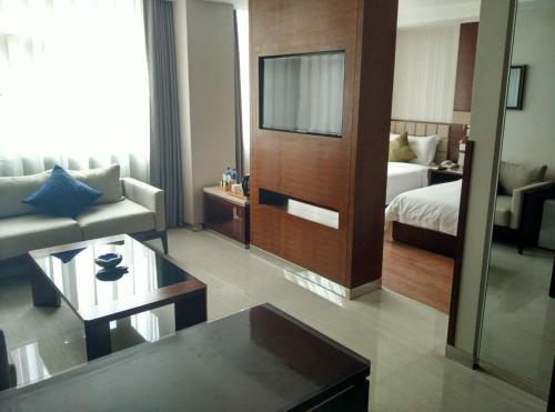 Imagen de la habitación del Hotel Feitian Meiju Baiyin Road Branch. Foto 9