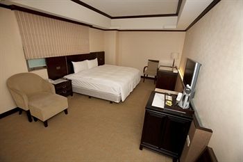 Imagen de la habitación del Hotel Felicity Business Hotel. Foto 4