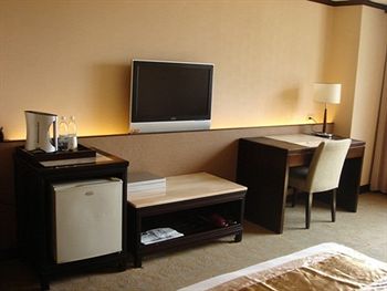 Imagen de la habitación del Hotel Felicity Business Hotel. Foto 8