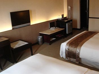 Imagen de la habitación del Hotel Felicity Business Hotel. Foto 9