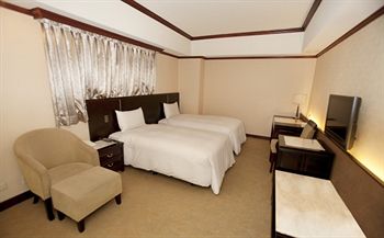 Imagen de la habitación del Hotel Felicity Business Hotel. Foto 11