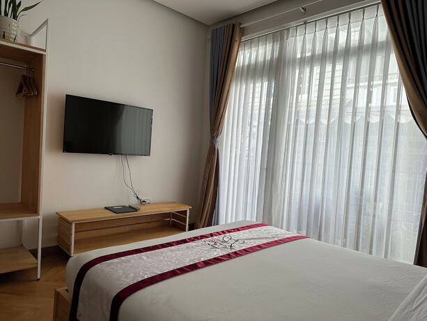 Imagen de la habitación del Hotel Feliz Dalat Homestay. Foto 13