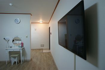 Imagen de la habitación del Hotel Feliz Town. Foto 9