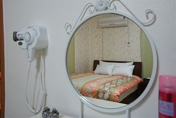 Imagen de la habitación del Hotel Feliz Town. Foto 12
